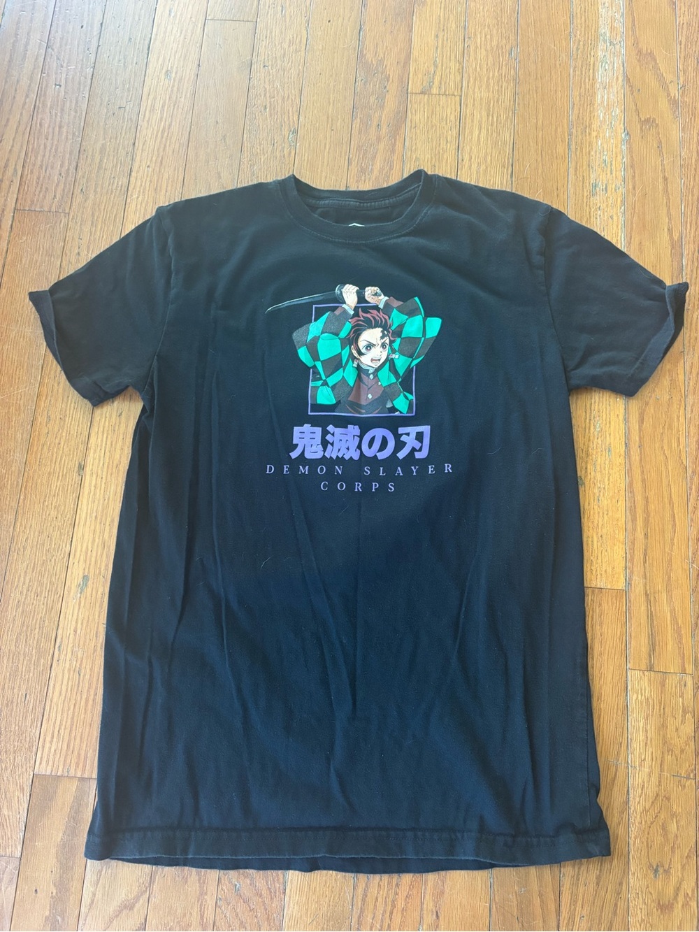 Demon Slayer Corps Black Graphic Tee featuring Tanjiro. Size Kids 18/20